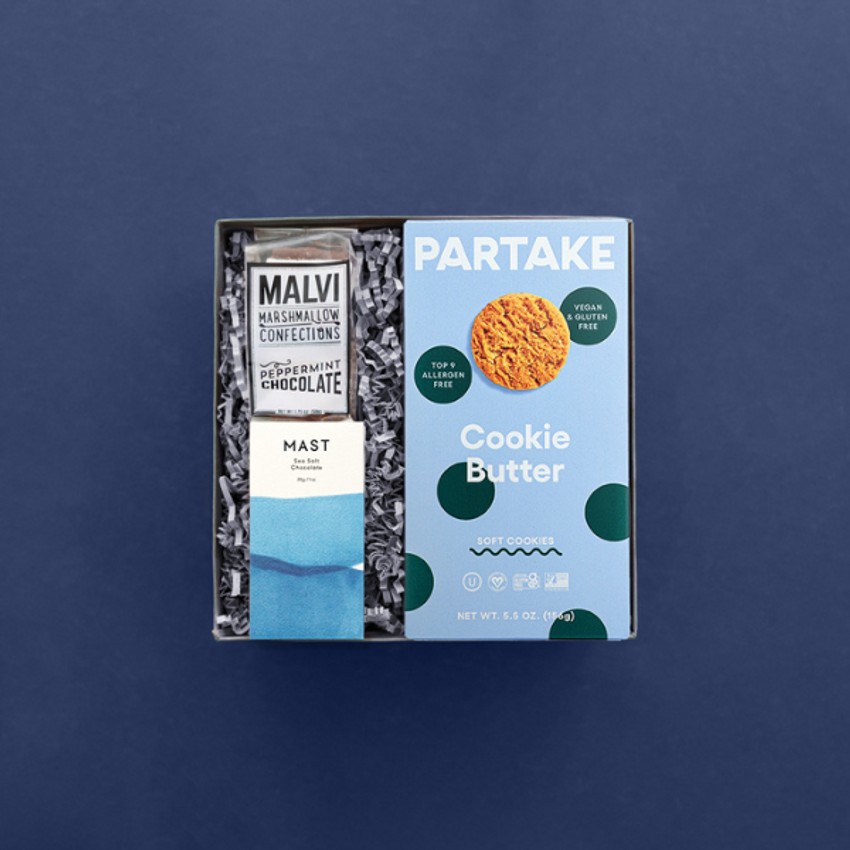 blue holiday gift box with partake cookies