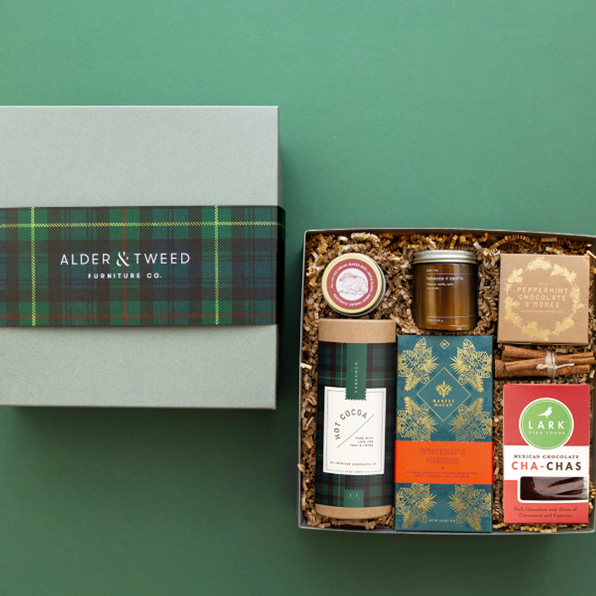 green plaid gift box with corporate branding