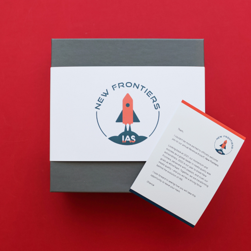 gift box with corporate branded packaging on a red background