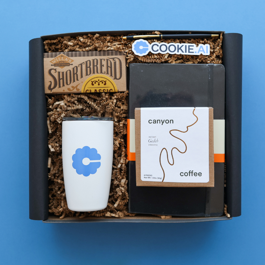 branded mug with blue cookie ai logo canyon coffee