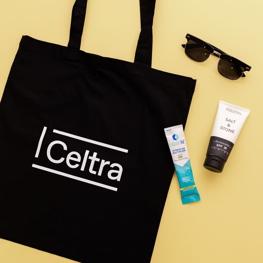 Celtra custom tote bag with sunglasses lotion and hydration packet