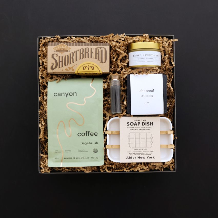 gift box with canyon coffee candle soap dish black background
