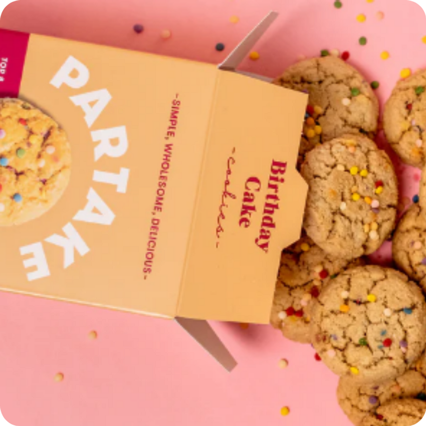 birthday cake partake cookies spilling out of box