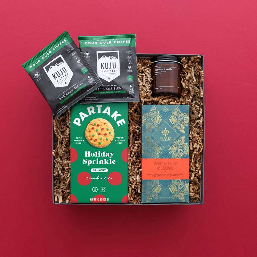 holiday gift box with green box of partake cookies