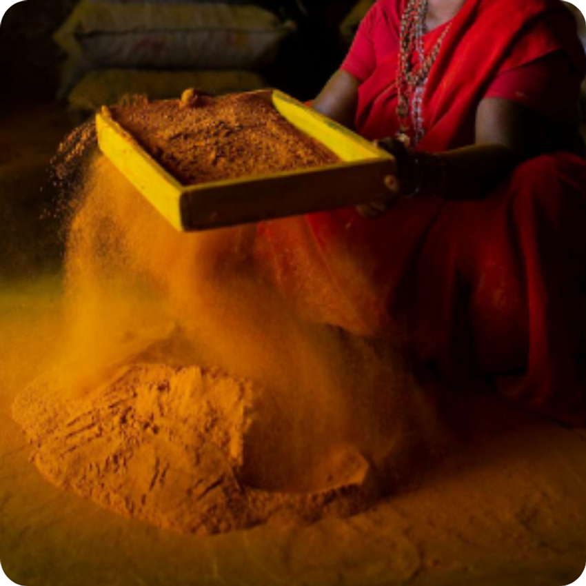 woman filtered turmeric