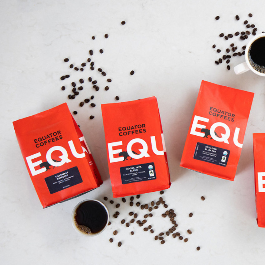 flat lay photo of coffee bags and beans